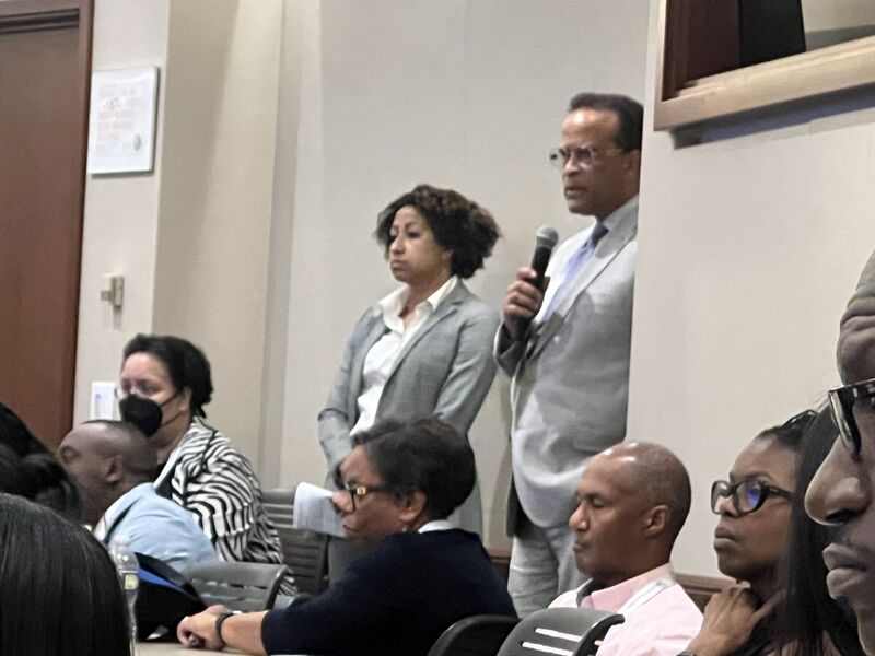 Participants engaging in an audience discussion